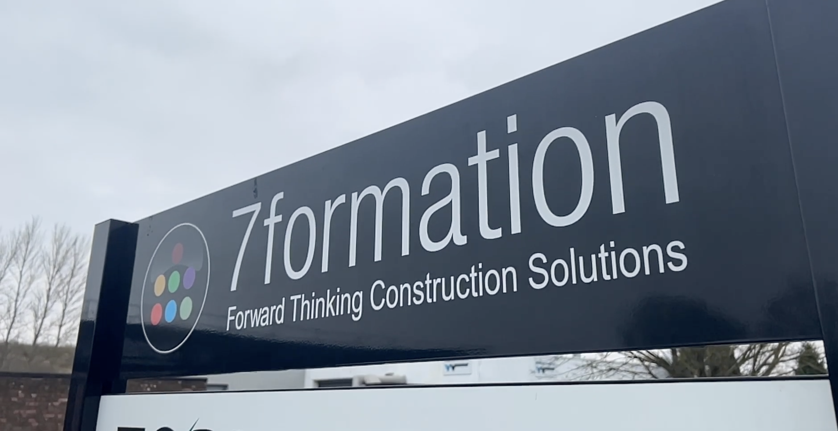 7formation logo building sign